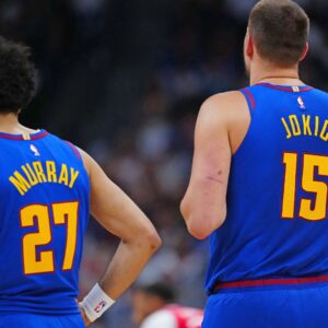 May 3, 2025; Denver, Colorado, USA; Denver Nuggets guard Jamal Murray (27) and Denver Nuggets center Nikola Jokic (15) during the first quarter against the LA Clippers during game seven of first round for the 2025 NBA Playoffs at Ball Arena