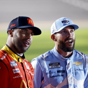 Feb 12, 2025; Daytona Beach, Florida, USA; NASCAR Cup Series driver Bubba Wallace (23) and NASCAR Cup Series driver Ross Chastain (1) during qualifying for the Daytona 500 at Daytona International Speedway. Mandatory Credit: Peter Casey-Imagn Images