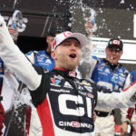 Oct 26, 2025; Martinsville, Virginia, USA; NASCAR Cup Series driver William Byron (24) celebrates his win following the Xfinity 500 at Martinsville Speedway. Mandatory Credit: Greg Atkins-Imagn Images