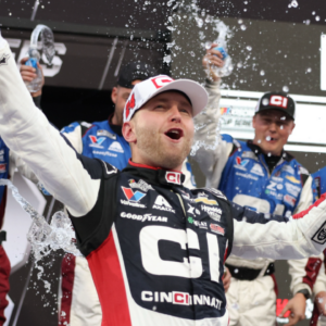 Oct 26, 2025; Martinsville, Virginia, USA; NASCAR Cup Series driver William Byron (24) celebrates his win following the Xfinity 500 at Martinsville Speedway. Mandatory Credit: Greg Atkins-Imagn Images