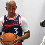 Los Angeles Clippers guard Chris Paul (3) poses during media day at Intuit Dome.