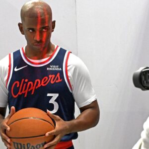 Los Angeles Clippers guard Chris Paul (3) poses during media day at Intuit Dome.