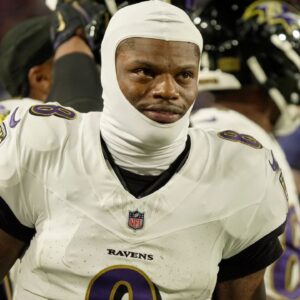 Baltimore Ravens quarterback Lamar Jackson gets ready to take the field during the second half of their game against the Baltimore Ravens at Highmark Stadium in Orchard Park on Sept. 7, 2025.