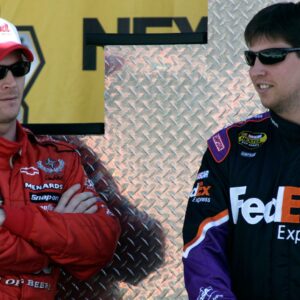 NASCAR Driver Dale Earnhardt Jr., Dale Earnhardt Jrl and Denny Hamlin are introduced during driver introductions prior to the Nextel Cup Ford 400 at Homestead-Miami Speedway in Homestead, Florida