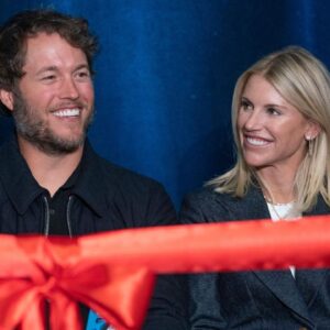 Mathew and Kelly Stafford share a laugh during speeches for the ribbon cutting of the Kelly and Matthew Stafford and Friends Education Center at the S.A.Y Detroit Play Center in Detroit on Monday, April 1, 2024.