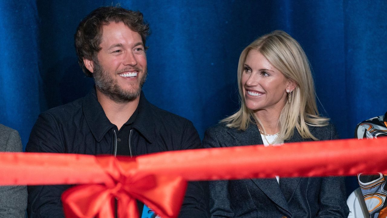 Mathew and Kelly Stafford share a laugh during speeches for the ribbon cutting of the Kelly and Matthew Stafford and Friends Education Center at the S.A.Y Detroit Play Center in Detroit on Monday, April 1, 2024.