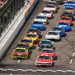 Mar 30, 2025; Martinsville, Virginia, USA; NASCAR Cup Series driver Josh Berry (21) leads the field on a restart during the Cook Out 400 at Martinsville Speedway