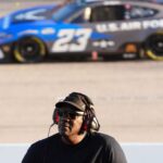 Sep 1, 2024; Darlington, South Carolina, USA; NASCAR Cup Series Team 23XI owner Michael Jordan watches a video board as NASCAR Cup Series driver Bubba Wallace (23) races during the Cook Out Southern 500 at Darlington Raceway