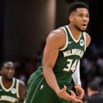 Oct 26, 2025; Cleveland, Ohio, USA; Milwaukee Bucks forward Giannis Antetokounmpo (34) celebrates after hitting a three point basket against the Cleveland Cavaliers during the second half at Rocket Arena.