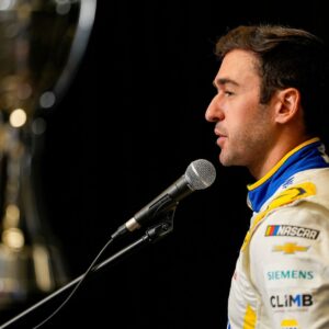 Aug 27, 2025; Charlotte, NC, USA; Chase Elliott answers questions from the media during NASCAR Cup Series Playoff Media Day at Charlotte Convention Center