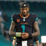 Miami Dolphins quarterback Tua Tagovailoa (1) walks off the field after the game against the New York Jets at Hard Rock Stadium.