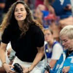 Sue Bird and Megan Rapinoe look on before the game between France and Germany in a men's basketball semifinal game during the Paris 2024 Olympic Summer Games at Accor Arena.