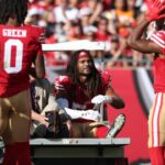 San Francisco 49ers middle linebacker Fred Warner (54) is carted off the field during the first quarter against the Tampa Bay Buccaneers at Raymond James Stadium.