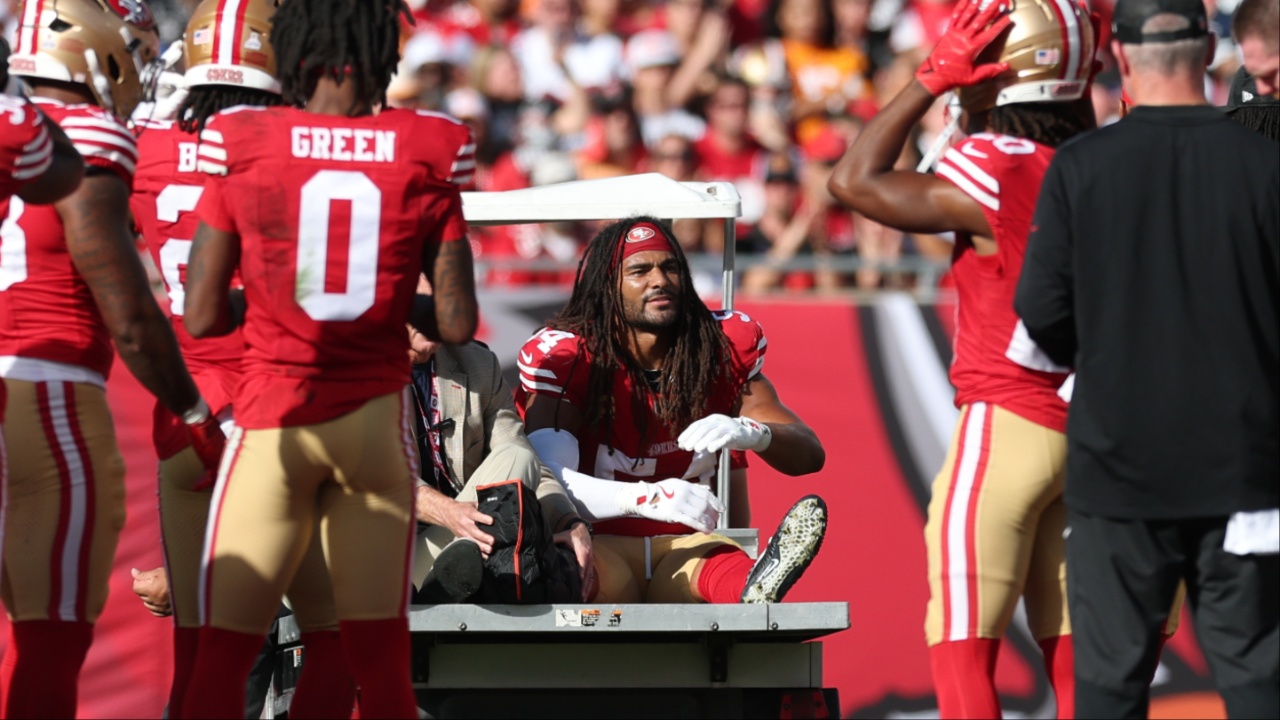 San Francisco 49ers middle linebacker Fred Warner (54) is carted off the field during the first quarter against the Tampa Bay Buccaneers at Raymond James Stadium.