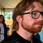 Driver Tyler Reddick stands by his No. 45 Toyota Camry XSE during a partnership announcement at The Pinnacle at Nashville Yards Tuesday, May 20, 2025, in Nashville, Tenn. Pinnacle Financial Partners and 23XI Racing will be involved in the NASCAR Cup Series race at Nashville Super Speedway on June 1.