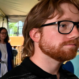 Driver Tyler Reddick stands by his No. 45 Toyota Camry XSE during a partnership announcement at The Pinnacle at Nashville Yards Tuesday, May 20, 2025, in Nashville, Tenn. Pinnacle Financial Partners and 23XI Racing will be involved in the NASCAR Cup Series race at Nashville Super Speedway on June 1.