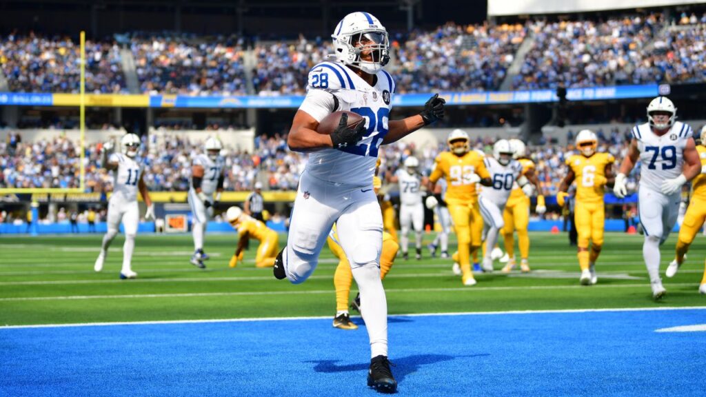 Indianapolis Colts running back Jonathan Taylor (28) scores a touchdown in the first quarter against the Los Angeles Chargers at SoFi Stadium.