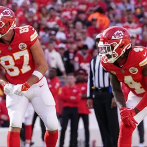 Kansas City Chiefs tight end Travis Kelce (87) and wide receiver Rashee Rice (4) line up against the Los Angeles Chargers during the game at GEHA Field at Arrowhead Stadium.