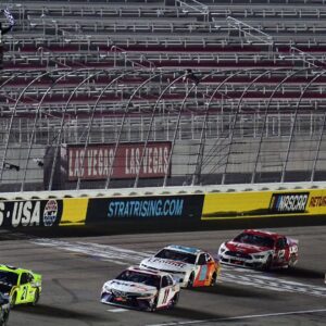 Sep 27, 2020; Las Vegas, Nevada, USA; NASCAR Cup Series driver Kurt Busch (1) leads driver Matt DiBenedetto (21) and driver Denny Hamlin (11) to win the South Point 400 at Las Vegas Motor Speedway