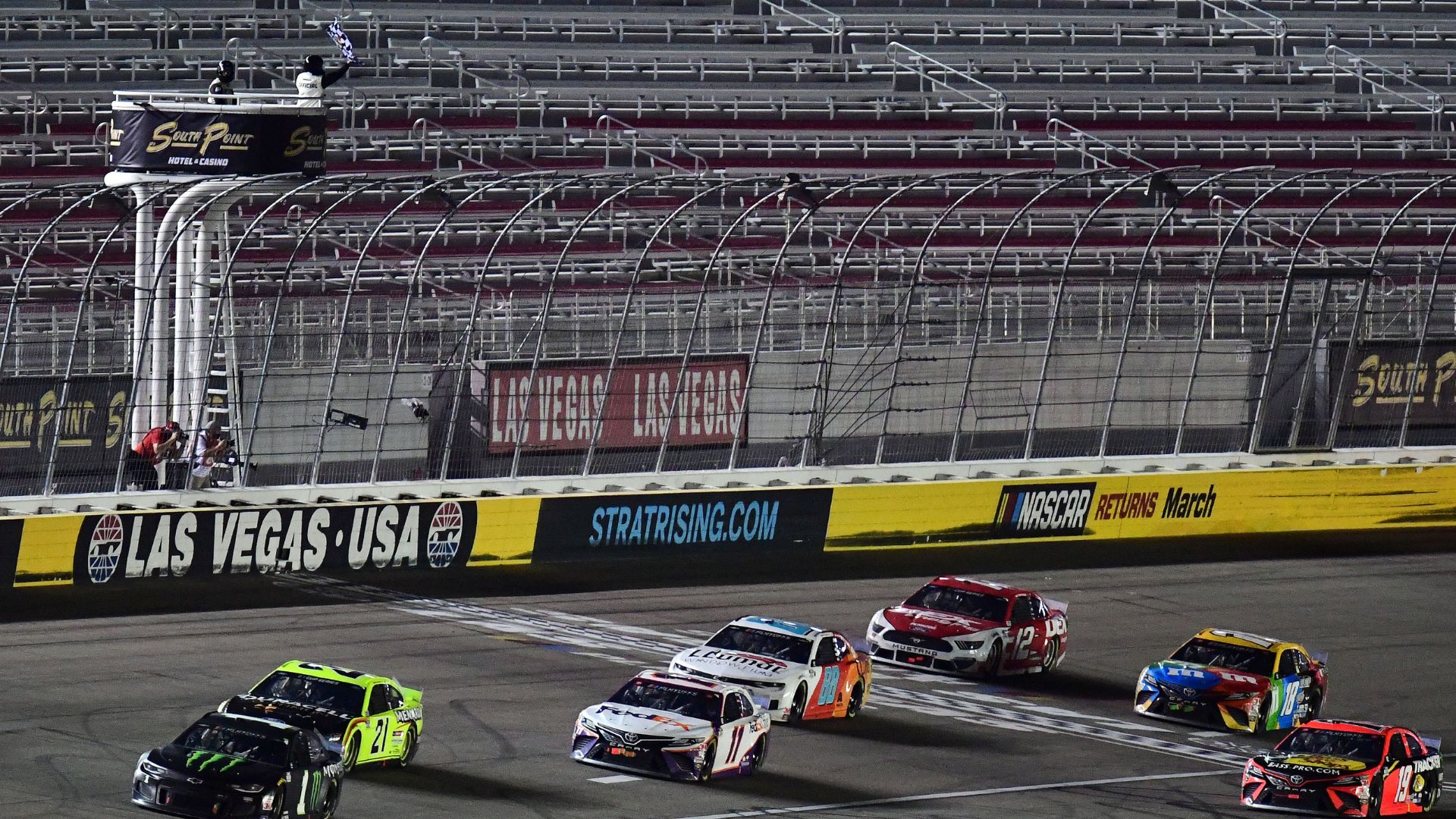 Sep 27, 2020; Las Vegas, Nevada, USA; NASCAR Cup Series driver Kurt Busch (1) leads driver Matt DiBenedetto (21) and driver Denny Hamlin (11) to win the South Point 400 at Las Vegas Motor Speedway
