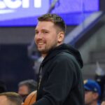 Luka Los Angeles Lakers forward/guard Luka Doncic (77) smiles from the sidelines during the second quarter against the Golden State Warriors at Chase Center.