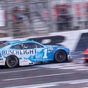Oct 5, 2025; Concord, North Carolina, USA; NASCAR Cup Series driver Ross Chastain (1) backs across the finish line at Charlotte Motor Speedway Road Course