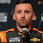 Aug 27, 2025; Charlotte, NC, USA; Austin Dillon answers questions from the media during NASCAR Cup Series Playoff Media Day at Charlotte Convention Center.