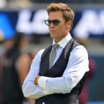 Tom Brady looks on before the game between the Los Angeles Chargers and the Washington Commanders at SoFi Stadium.
