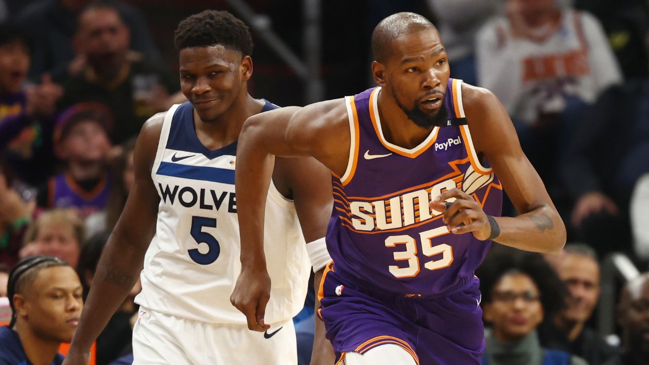 Phoenix Suns forward Kevin Durant (35) against Minnesota Timberwolves guard Anthony Edwards (5) at Footprint Center