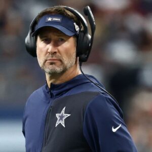 Dallas Cowboys head coach Brian Schottenheimer looks on prior to the game against the Washington Commanders at AT&T Stadium.
