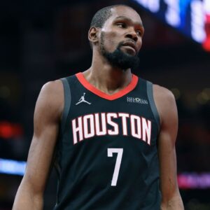Houston Rockets forward Kevin Durant (7) reacts after a play during the fourth quarter against the Denver Nuggets at Toyota Center.