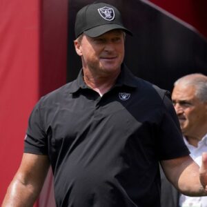 Las Vegas Raiders head coach Jon Gruden walks onto the field before the start of the game against the San Francisco 49ers at Levi's Stadium.