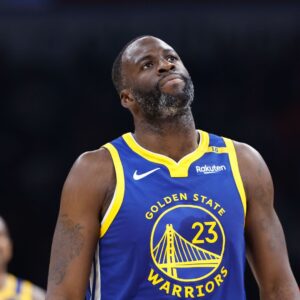 Nov 10, 2024; Oklahoma City, Oklahoma, USA; Golden State Warriors forward Draymond Green (23) looks at the scoreboard after a play against the Oklahoma City Thunder during the second quarter at Paycom Center.