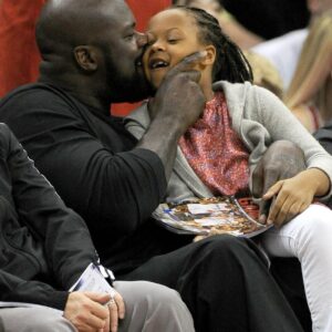 November 11, 2012; Los Angeles, CA, USA; NBA former player Shaquille O'Neal watches the game between the Los Angeles Clippers and the Atlanta Hawks with his daughter Me'arah, 6, at the Staples Center.
