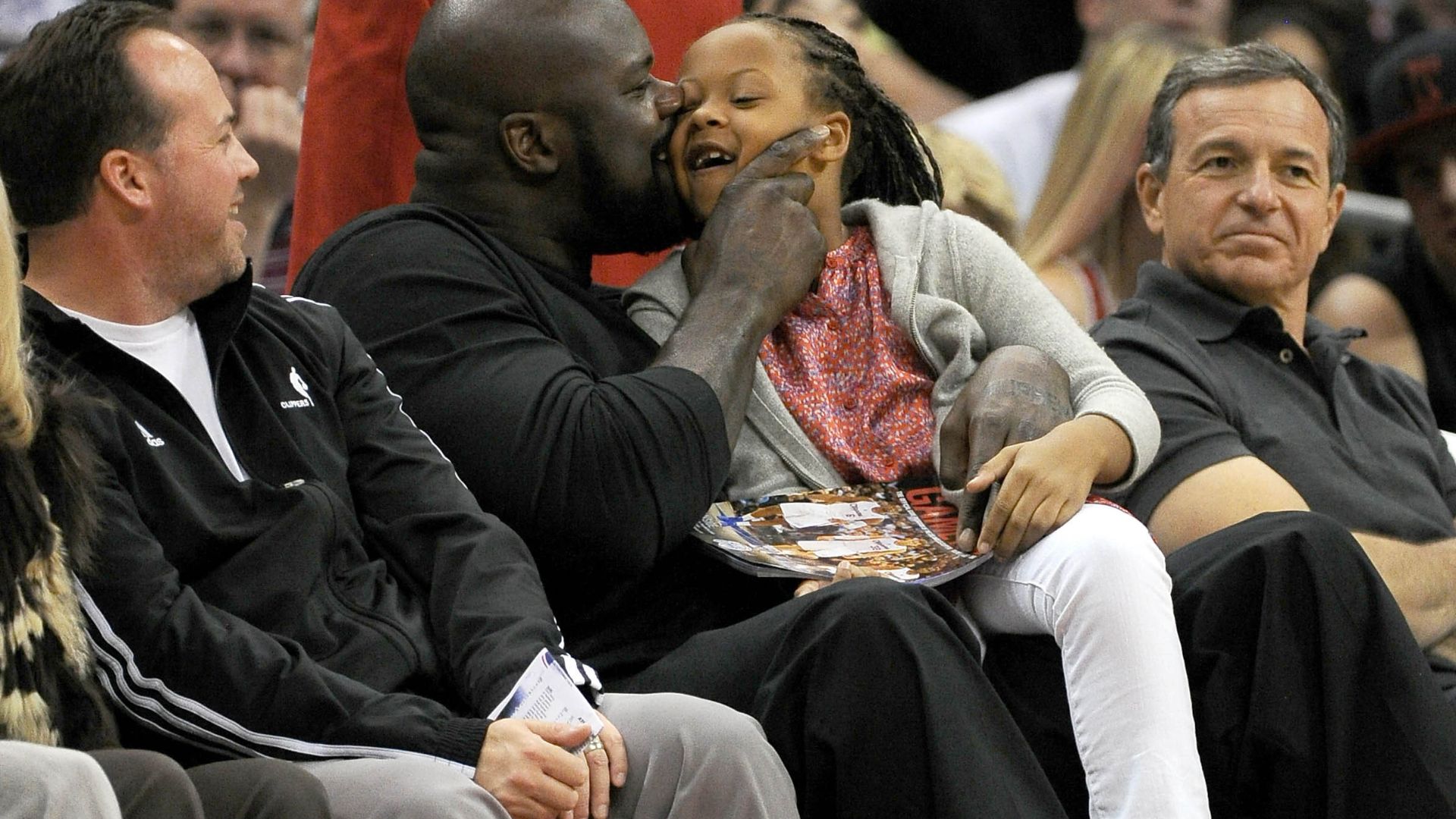 November 11, 2012; Los Angeles, CA, USA; NBA former player Shaquille O'Neal watches the game between the Los Angeles Clippers and the Atlanta Hawks with his daughter Me'arah, 6, at the Staples Center.