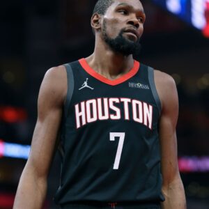 Nov 21, 2025; Houston, Texas, USA; Houston Rockets forward Kevin Durant (7) reacts after a play during the fourth quarter against the Denver Nuggets at Toyota Center.