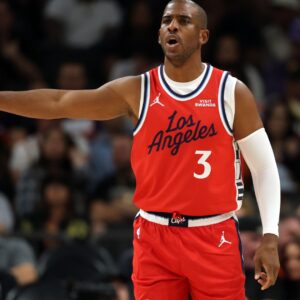 Nov 6, 2025; Phoenix, Arizona, USA; Los Angeles Clippers guard Chris Paul (3) against the Phoenix Suns in the first half at the Mortgage Matchup Center