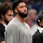 Nov 19, 2025; Dallas, Texas, USA; Dallas Mavericks forward Anthony Davis (3) looks on from the bench during the second half against the New York Knicks at the American Airlines Center.