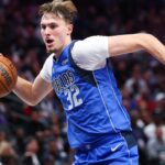 Nov 5, 2025; Dallas, Texas, USA; Dallas Mavericks forward Cooper Flagg (32) dribbles during the second half against the New Orleans Pelicans at American Airlines Center.