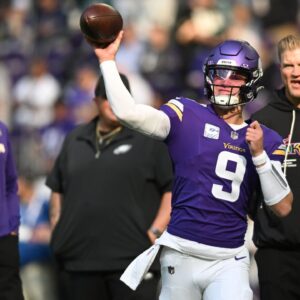 Minnesota Vikings quarterback J.J. McCarthy (9) throws a pass during warm ups before the game against the Philadelphia Eagles at U.S. Bank Stadium.