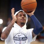 Nov 3, 2025; Memphis, Tennessee, USA; Memphis Grizzlies guard Ja Morant (12) shoots during warm ups prior to the game against the Detroit Pistons at FedExForum.