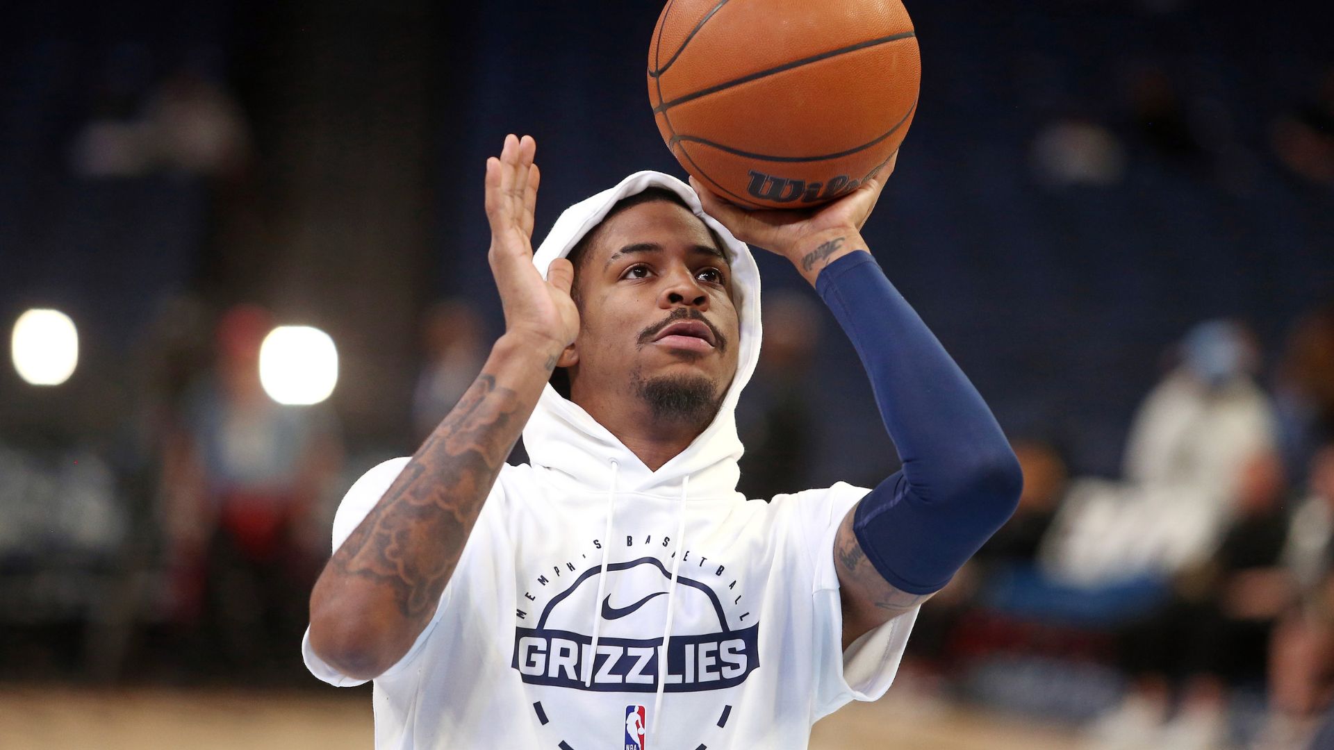 Nov 3, 2025; Memphis, Tennessee, USA; Memphis Grizzlies guard Ja Morant (12) shoots during warm ups prior to the game against the Detroit Pistons at FedExForum.