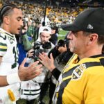 Pittsburgh Steelers quarterback Aaron Rodgers (8) and Green Bay Packers quarterback Jordan Love (10) shake hands after the game at Acrisure Stadium.