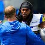 Los Angeles Rams wide receiver Davante Adams (17) hugs coach Sean McVay before the game against the Houston Texans at SoFi Stadium.