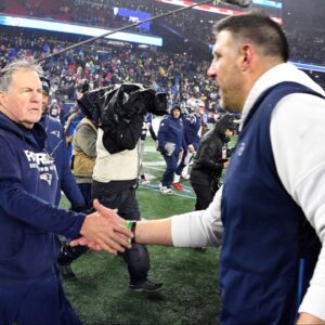 New England Patriots head coach Bill Belichick shakes hands with Tennessee Titans head coach Mike Vrabel after the Patriots lost to the Titans at Gillette Stadium.