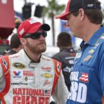 Jul 6, 2014; Daytona Beach, FL, USA; NASCAR Sprint Cup Series driver Dale Earnhardt Jr. And NASCAR crew chief Steve Letarte before the Coke Zero 400 at Daytona International Speedway.