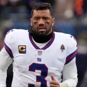 New York Giants quarterback Russell Wilson (3) leaves the field after losing to the Chicago Bears at Soldier Field.