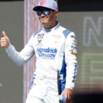 Mar 2, 2025; Austin, Texas, USA; NASCAR Cup Series driver Kyle Larson (5) walks out onto the stage for driver introductions before the EchoPark Automotive Grand Prix at Circuit of the Americas