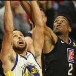 LA Clippers guard Shai Gilgeous-Alexander 2 goes for a rebound against Golden State Warriors guard Stephen Curry 30 during game 6 of the Golden State Warriors vs Los Angeles Clippers Playoffs series at Staples Center on April 26, 2019.