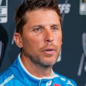 Aug 27, 2025; Charlotte, NC, USA; Denny Hamlin answers questions from the media during NASCAR Cup Series Playoff Media Day at Charlotte Convention Center.